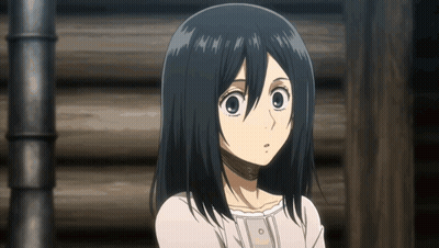 Girl With Black Hair Standing In Front Of Wooden Wall GIF