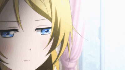 Girl With Blonde Hair And Blue Eyes Making Face GIF