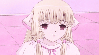Girl With Blonde Hair And Pigtails Sitting GIF