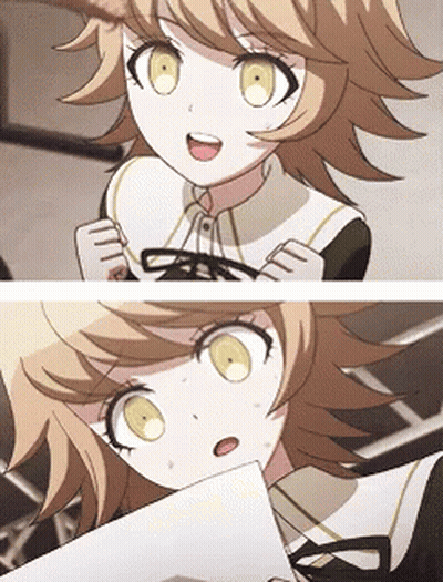 Girl With Blonde Hair And Yellow Eyes Holding Paper GIF