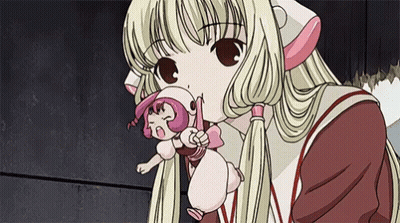 Girl With Blonde Hair Holding Pink Doll GIF
