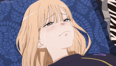 Girl With Blonde Hair Lying On Zebra Pillow GIF