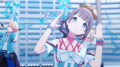 Girl With Blue Eyes And Straw Hat Stands In Front Of Building GIF
