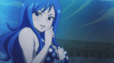 Girl With Blue Hair In Polka Dot Bikini Smiling GIF