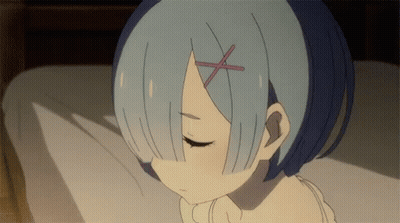 Girl With Blue Hair Laying On Bed GIF