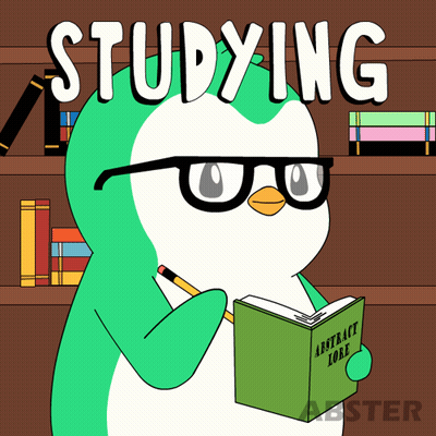 Girl With Blue Hair Sitting At Desk With Book GIF