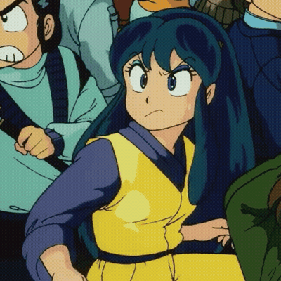 Girl With Blue Hair Sitting In Crowd GIF