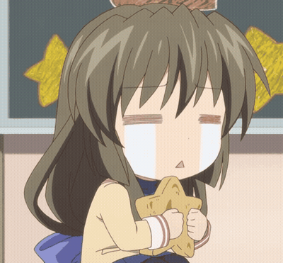 Girl With Brown Hair Holding Star Making Funny Face GIF