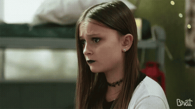 Girl With Choker Saying Brat GIF