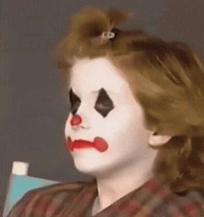 Girl With Clown Face Paint And Red Nose GIF