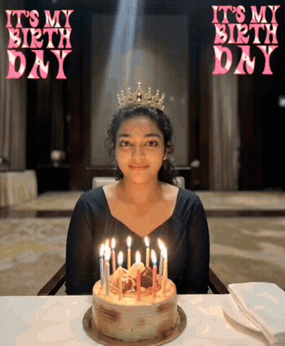 Girl With Crown Sitting In Front Of Birthday Cake GIF
