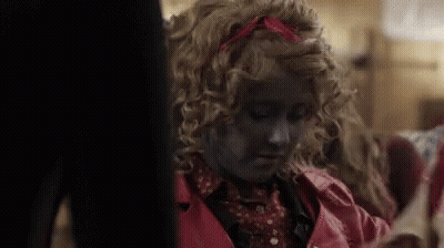 Girl With Curly Blonde Hair And Red Headband GIF