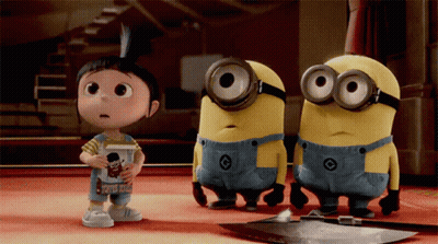 Girl With Despicable Me Book And Two Minions GIF