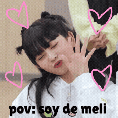 Girl With Eyes Closed Surrounded By Pink Hearts GIF