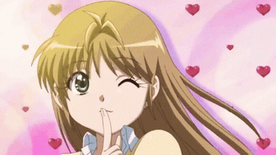 Girl With Finger On Lips Surrounded By Hearts GIF