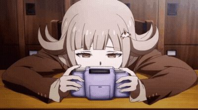 Girl With Flower In Hair Holding Game Console GIF