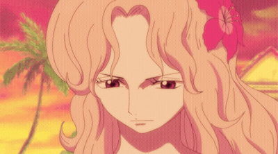 Girl With Flower In Hair Looking At Camera GIF