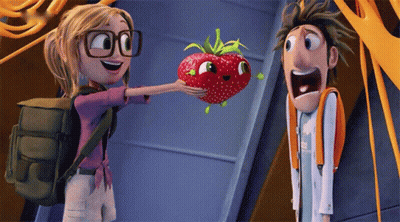 Girl With Glasses Holding Strawberry With Face GIF