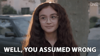Girl With Glasses Says Well You Assumed Wrong In Front Of Car GIF