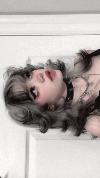 Girl With Gray Hair Wearing Choker And Necklace GIF
