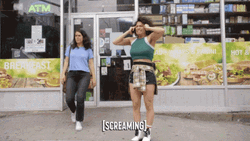 Girl With Green Top Screaming Yelling GIF