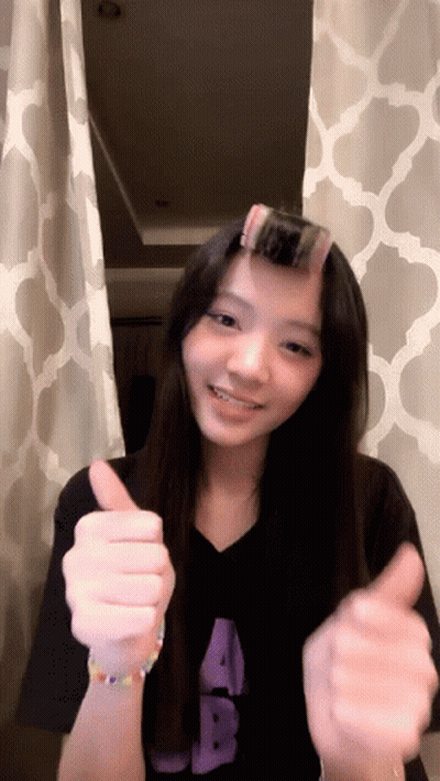 Girl With Hair Curlers Thumbs Up GIF