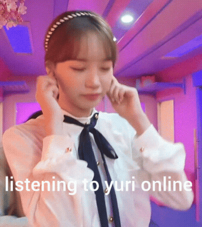 Girl With Headband Covering Ears Listening To Yuri Online GIF