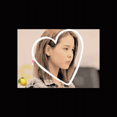 Girl With Heart Around Her Saying Love GIF