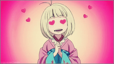Girl With Hearts In Eyes Surrounded By Pink Hearts GIF
