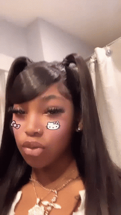 Girl With Hello Kitty Sticker And Necklace GIF