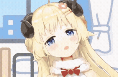 Girl With Horns Smiling In Santa Outfit GIF