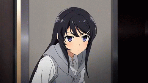 Girl With Long Black Hair And Blue Eyes In Doorway GIF