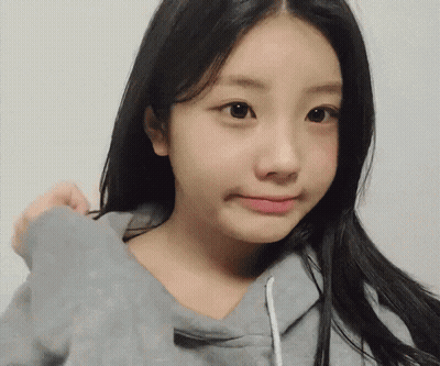 Girl With Long Black Hair In Gray Hoodie GIF