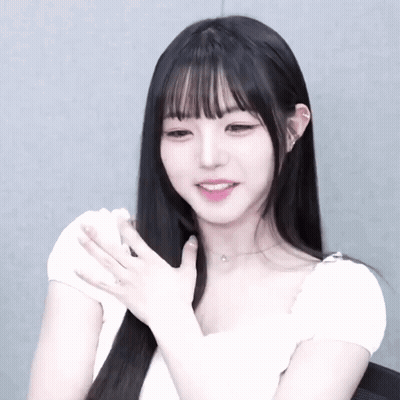 Girl With Long Black Hair in White Shirt