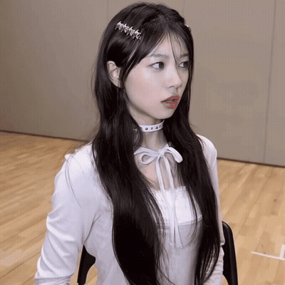 Girl With Long Black Hair in White Shirt