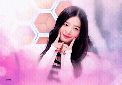 Girl With Long Black Hair Making Heart With Hands GIF