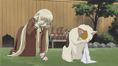 Girl With Long Blonde Hair Kneeling Next To Cat GIF
