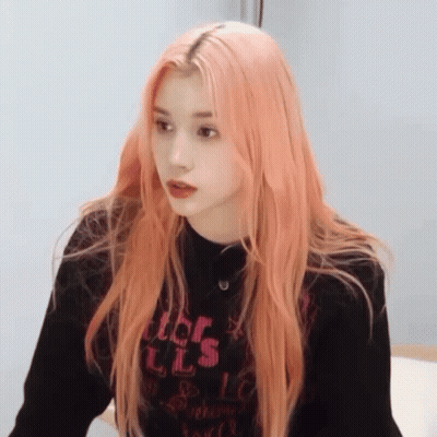 Girl With Long Pink Hair In Black Sweater GIF
