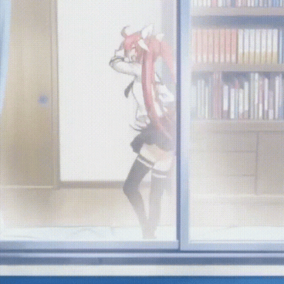 Girl With Long Red Hair Dancing In Front Of Bookshelf GIF
