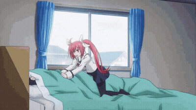 Girl With Long Red Hair Kneeling On Bed GIF