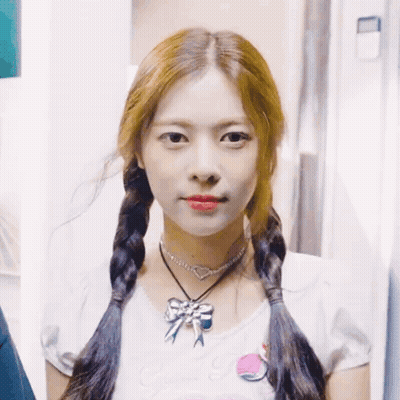 Girl With Pigtails And Necklace With Bow GIF