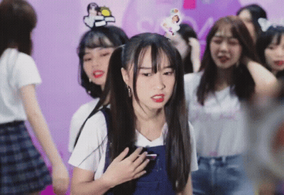 Girl With Pigtails And Sticker Saying A GIF