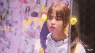 Girl With Pigtails And Yellow Duck In Hair GIF