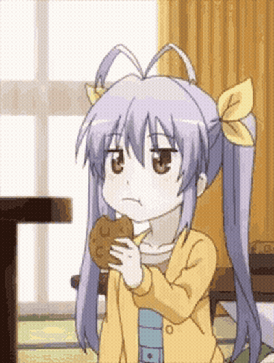 Girl With Pigtails Holding Cookie