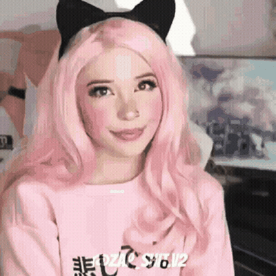 Girl With Pink Hair And Cat Ears Smiling In Pink Sweater GIF