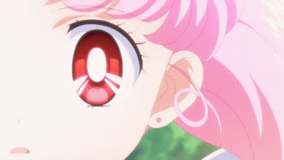 Girl With Pink Hair And Red Eye Close Up GIF