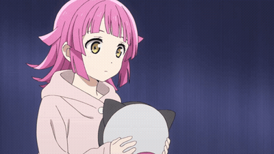 Girl With Pink Hair Holding Cat-Shaped Object GIF