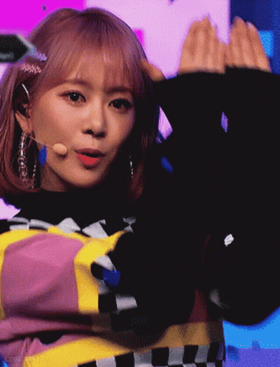 Girl With Pink Hair In Black Sweater GIF