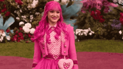 Girl With Pink Hair In Flower Garden GIF