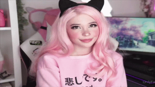Girl With Pink Hair In Pink Sweater With Chinese Writing GIF